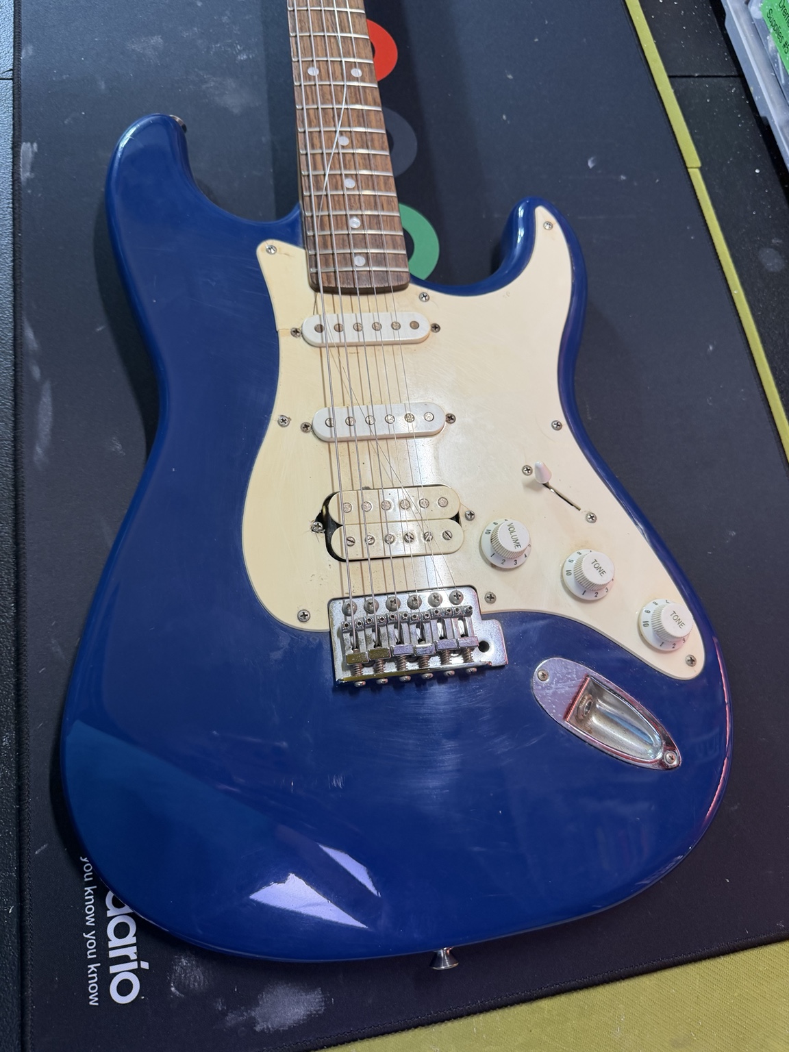 Before restoration: full-length view of the guitar